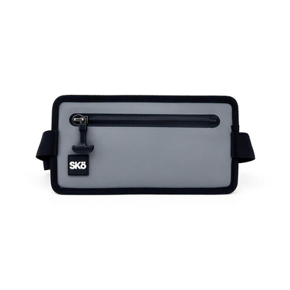 Phone Pouch in Stone Gray, straight-on front product view with black zipper and SKÖ logo.