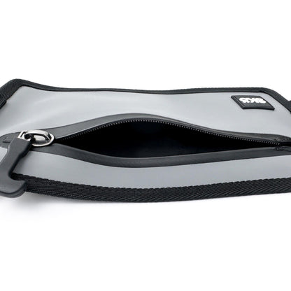 Phone Pouch in Stone Gray, close-up of the open zipper showing the dark interior pocket.