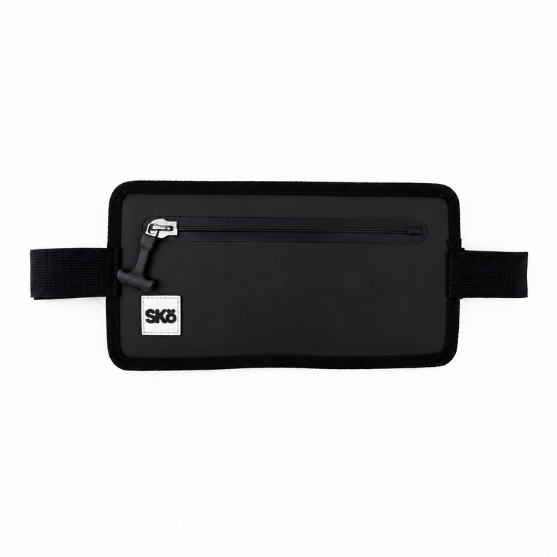 Phone Pouch in Matte Black, SKÖ waterproof phone pouch front studio photo with black straps, sealed zipper and white square SKÖ logo.